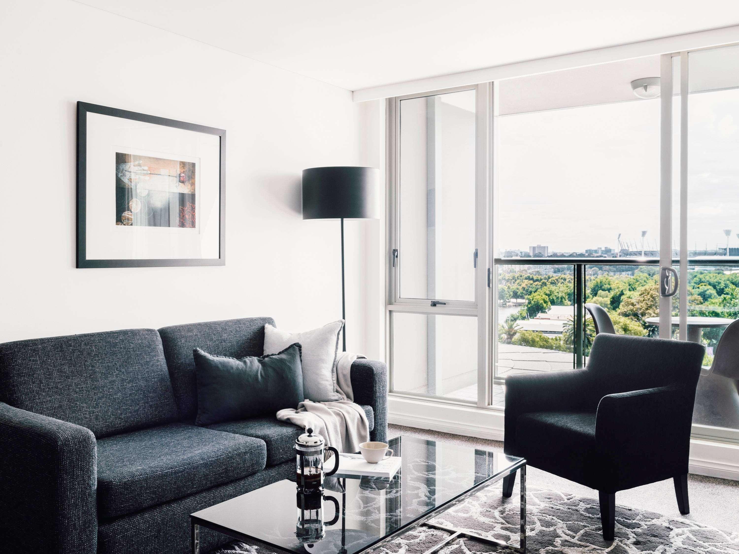 Quay West Suites Melbourne Exterior photo A living room