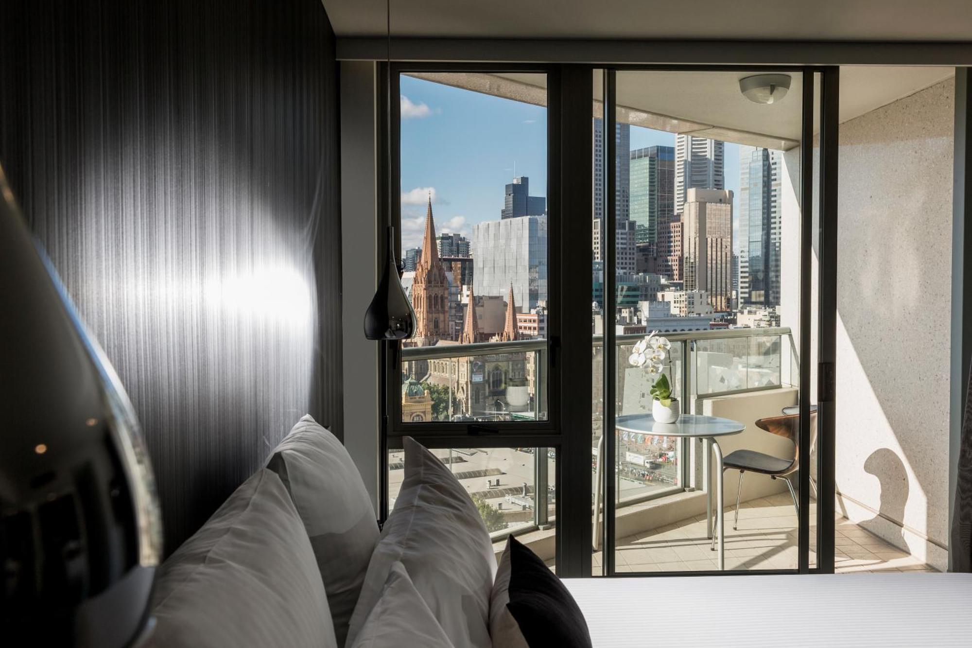 Quay West Suites Melbourne Exterior photo The view from a bedroom at the hotel